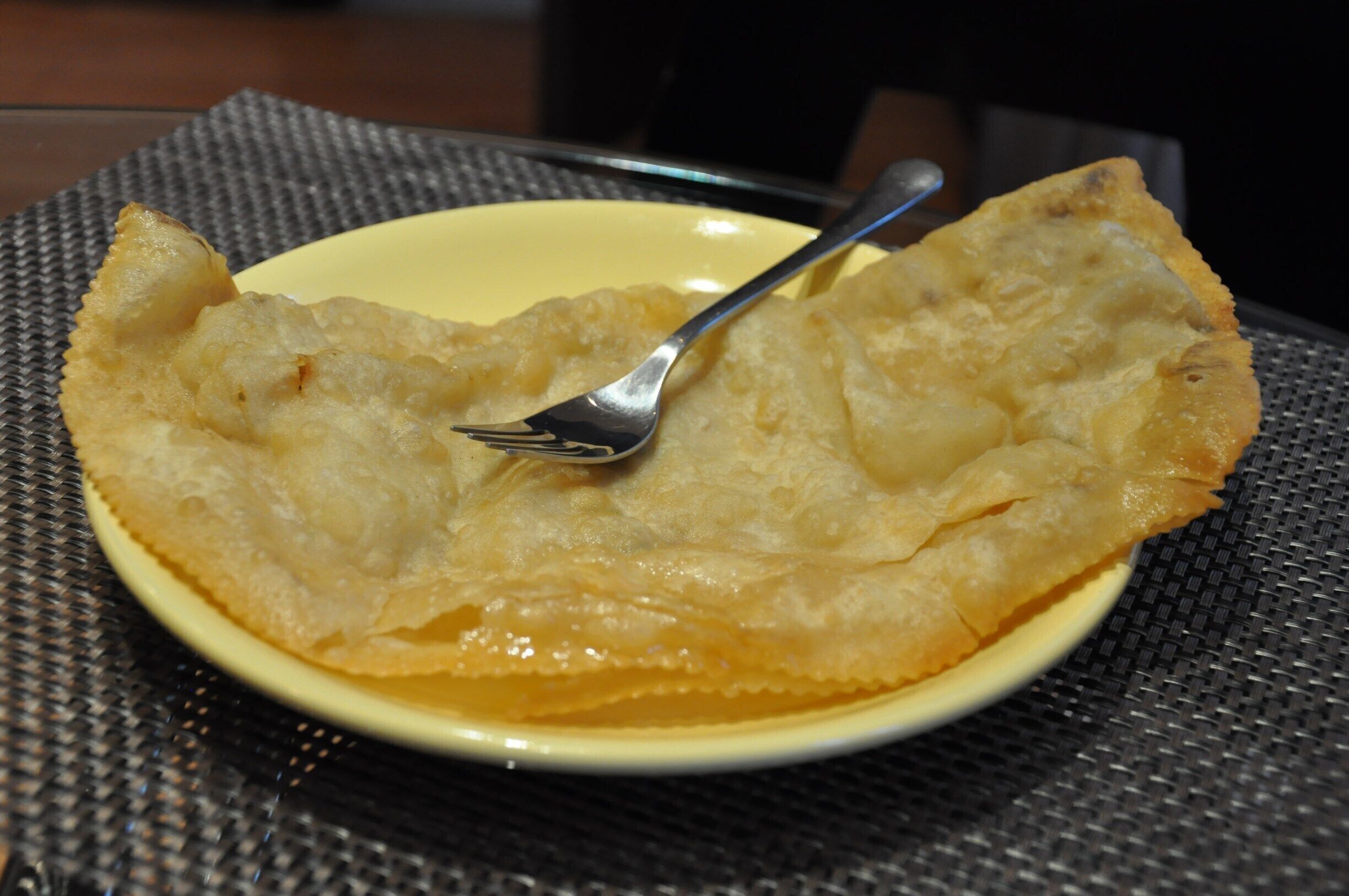 This is a cheburek.  It's very thin fried dough with meat and sour cream and maybe some greens spread in the middle.  I'm not a huge fan of friend dough, so I'd rather go with the shwarma offered by this little café, but I had to give cheburek a try since I'd never heard of it before!  This tiny café has a small bar and a handful of tables with bench seats and chairs tucked into its corner location.  Or, you can get your food to go.