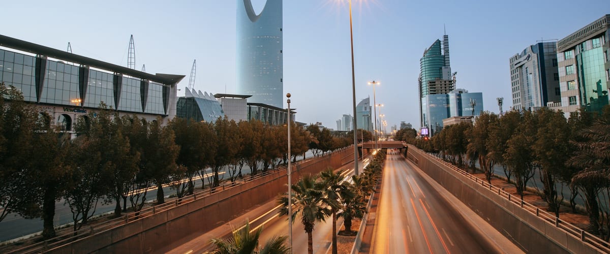Saudi Arabia which includes modern architecture, a city and night scenes
