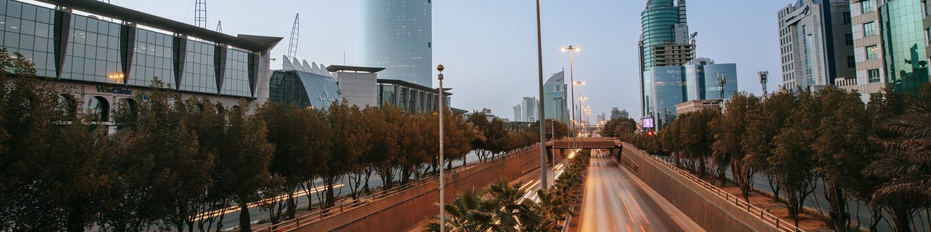 Saudi Arabia which includes modern architecture, a city and night scenes