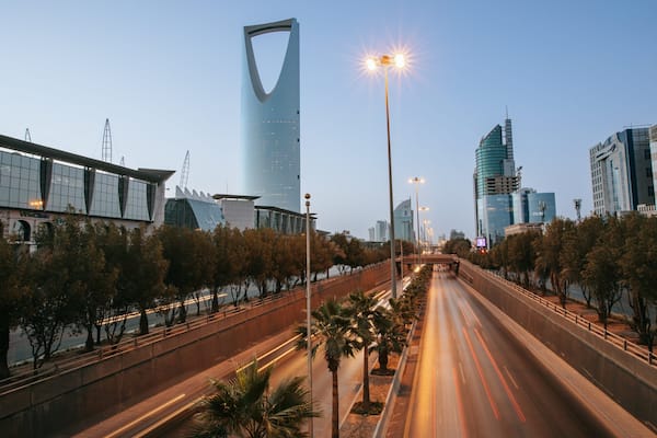 Saudi Arabia which includes modern architecture, a city and night scenes