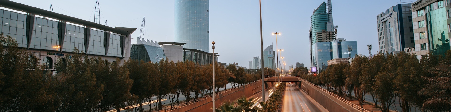 Saudi Arabia which includes modern architecture, a city and night scenes