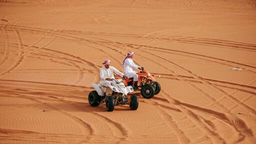 Saudi Arabia showing motorcycle riding and desert views