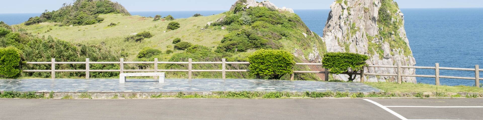 Iki, Nagasaki, Japan. June 7, 2023. Monkey Rock created by nature over many years looks just like a monkey facing away is a popular tourist destination.
