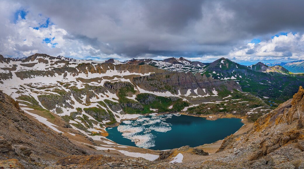 From the Ridgeline below Three Needles Peak at 13,200' yo can look west and see the other Blue Lake of Colorado. the hike up through Porphyry Basin upper and lower lakes are quite special. "Not the Blue lake at Mt Sneffels"