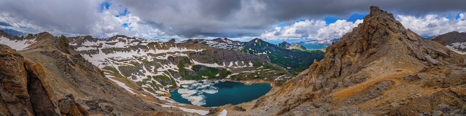 From the Ridgeline below Three Needles Peak at 13,200' yo can look west and see the other Blue Lake of Colorado. the hike up through Porphyry Basin upper and lower lakes are quite special. "Not the Blue lake at Mt Sneffels"