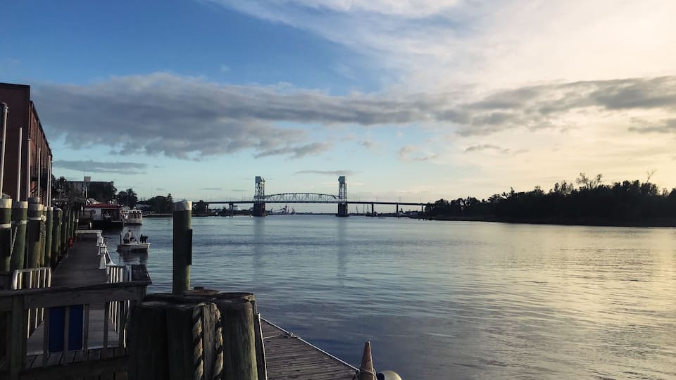 Eating dinner and watching the sunset on the Boardwalk in Wilmington, NC
