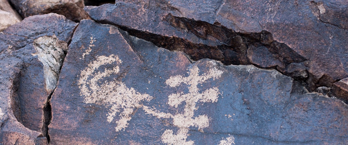 A rock with ancient petroglyphs.