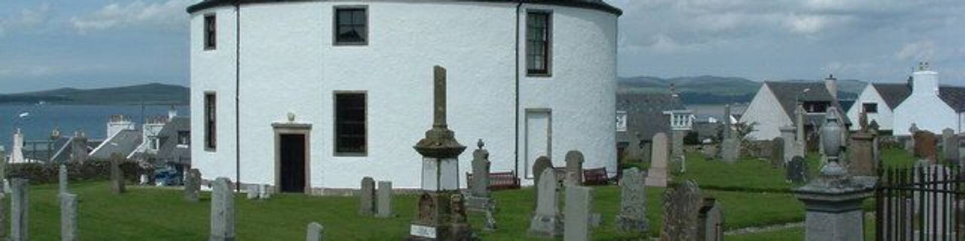 Bowmore round Church. Cemetery and round church as viewed from the south side of Bowmore