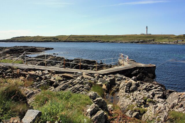 Port Wemyss Pier Across the water is the island of Orsay and the Orsay lighthouse.
