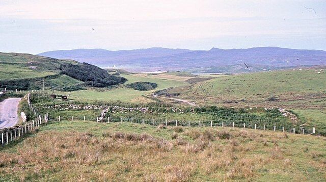 The Oa road at Cragabus Looking north east along the line of the road that traverses the Oa peninsula. The hills of eastern Islay in the distance.