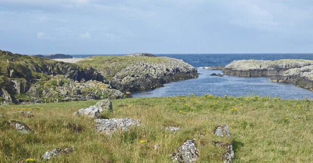 Cove with gannets on southwest Islay Not readily visible in the image are gannets sighted at the time of the photograph. Hooded crows were also observed in this locale.