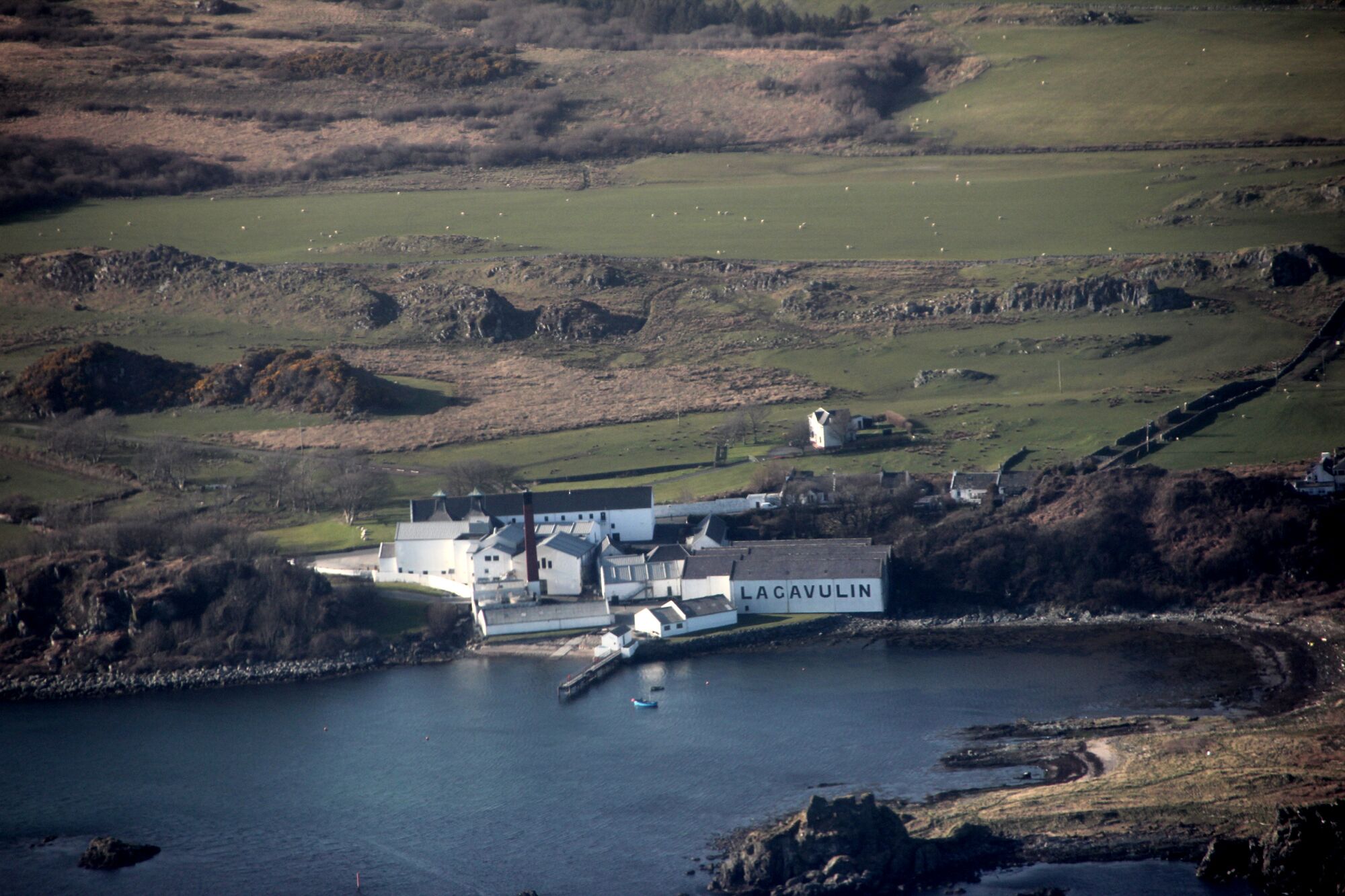A coastal industrial facility named Lacavulin near a body of water.