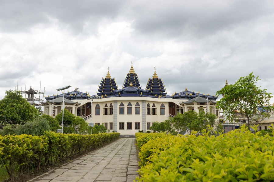 Imphal city, Manipur state, India. ISKCON Temple surrounded by green and yellow plants. stunning view and angle