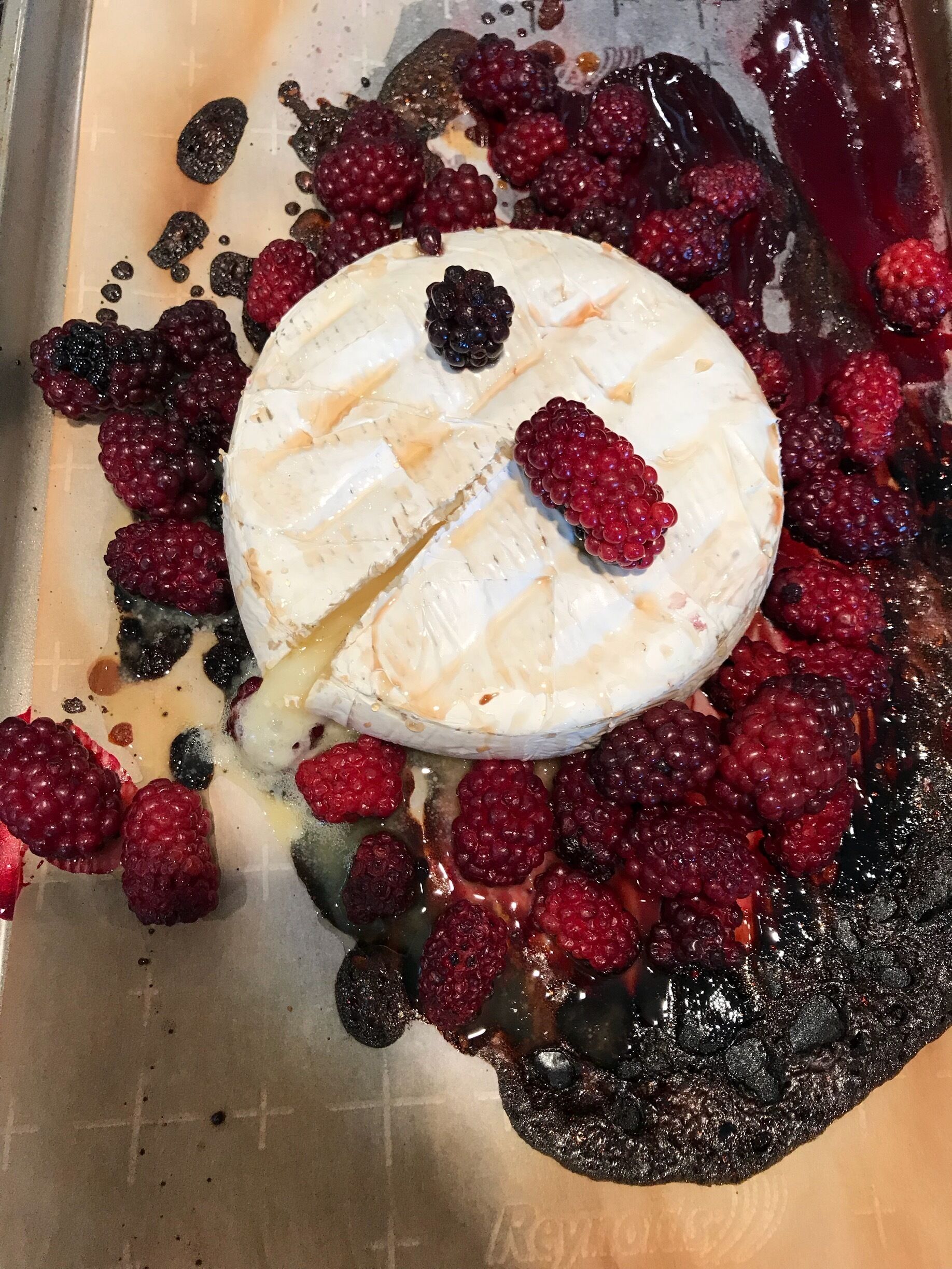 Yummy Brie with honey, raspberry and blueberry. 