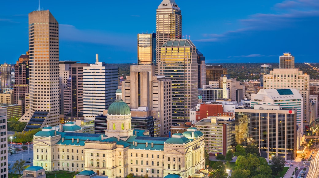 Indianapolis, Indiana, USA downtown city skyline with the State House at dusk.