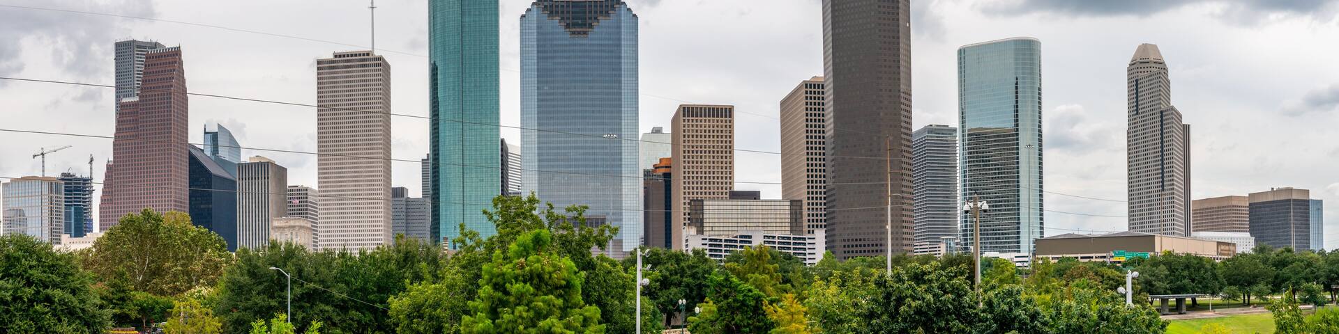 Wide Angle Panorama of the City of Houston Buildings with Cloudy Stormy Skies