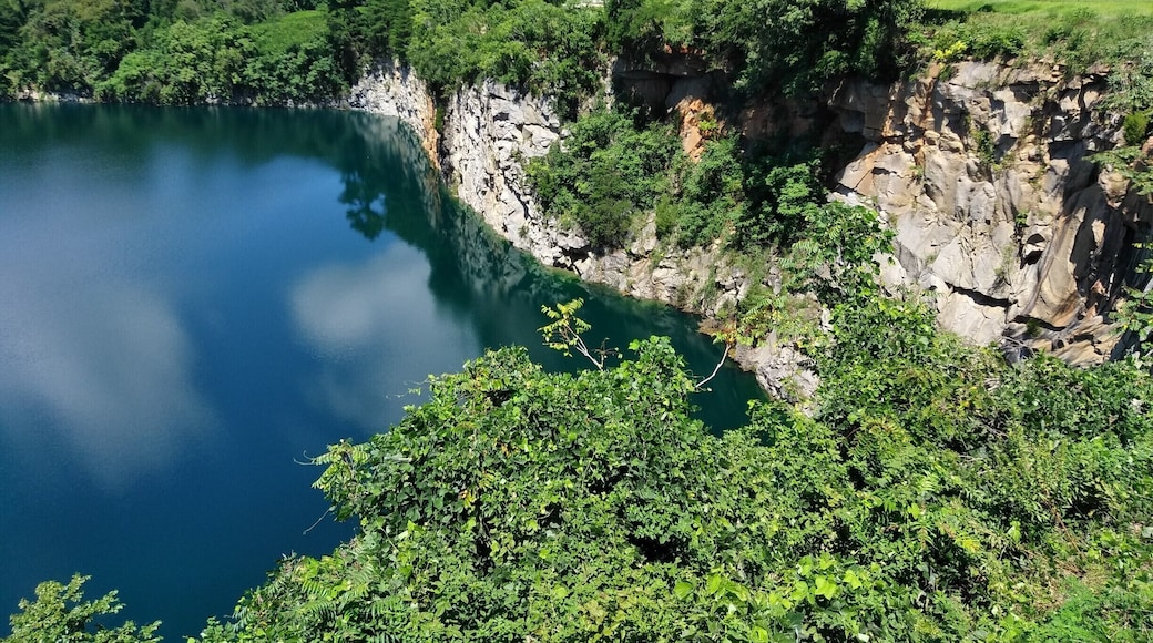 For years this rain-filled granite quarry sat in the city center unbeknownst to the locals. Now the city has spent millions developing public park around it, including observation platform that extends over the water.