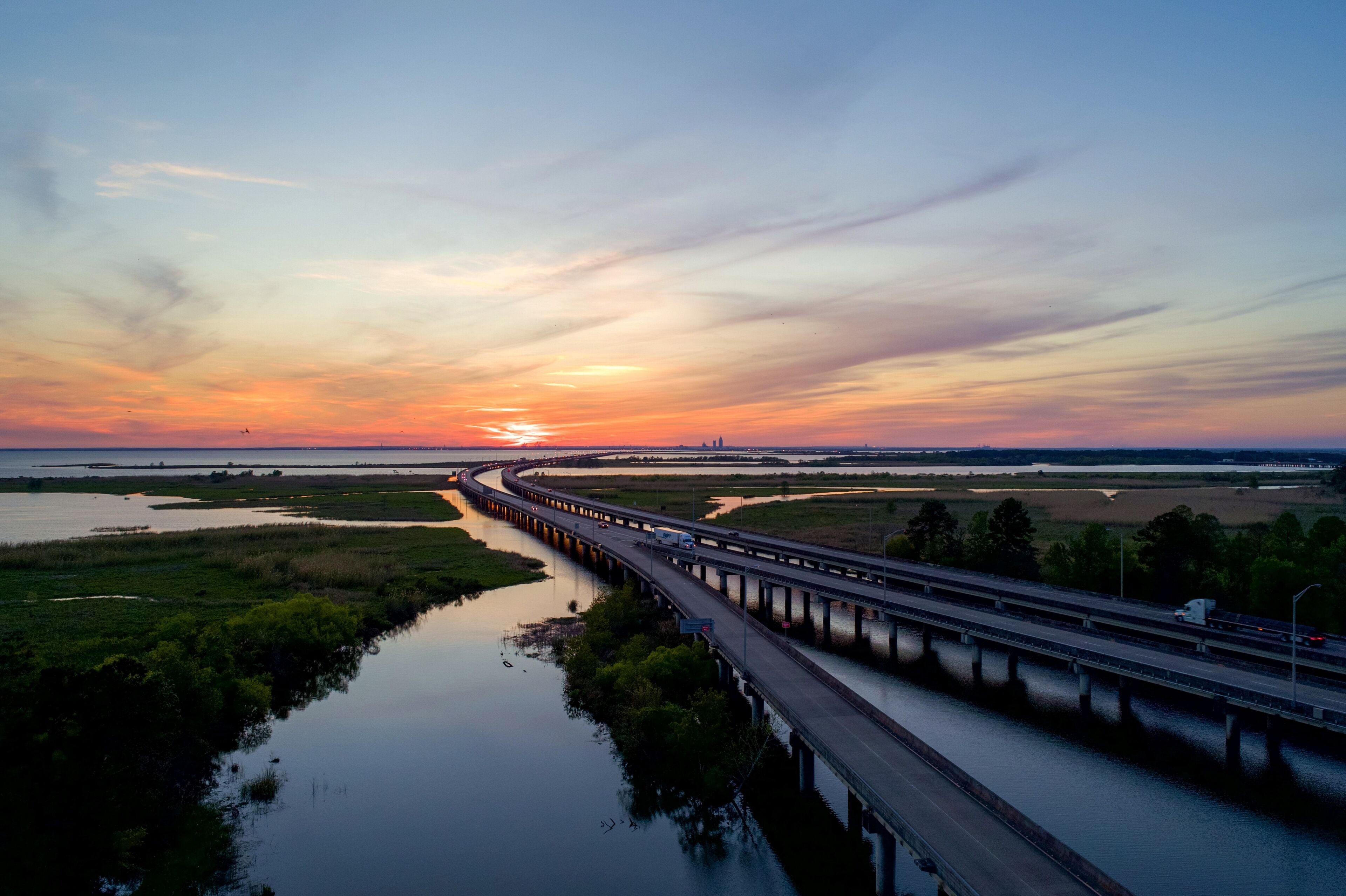 Mobile Bay and jubilee parkway bridge at sunset