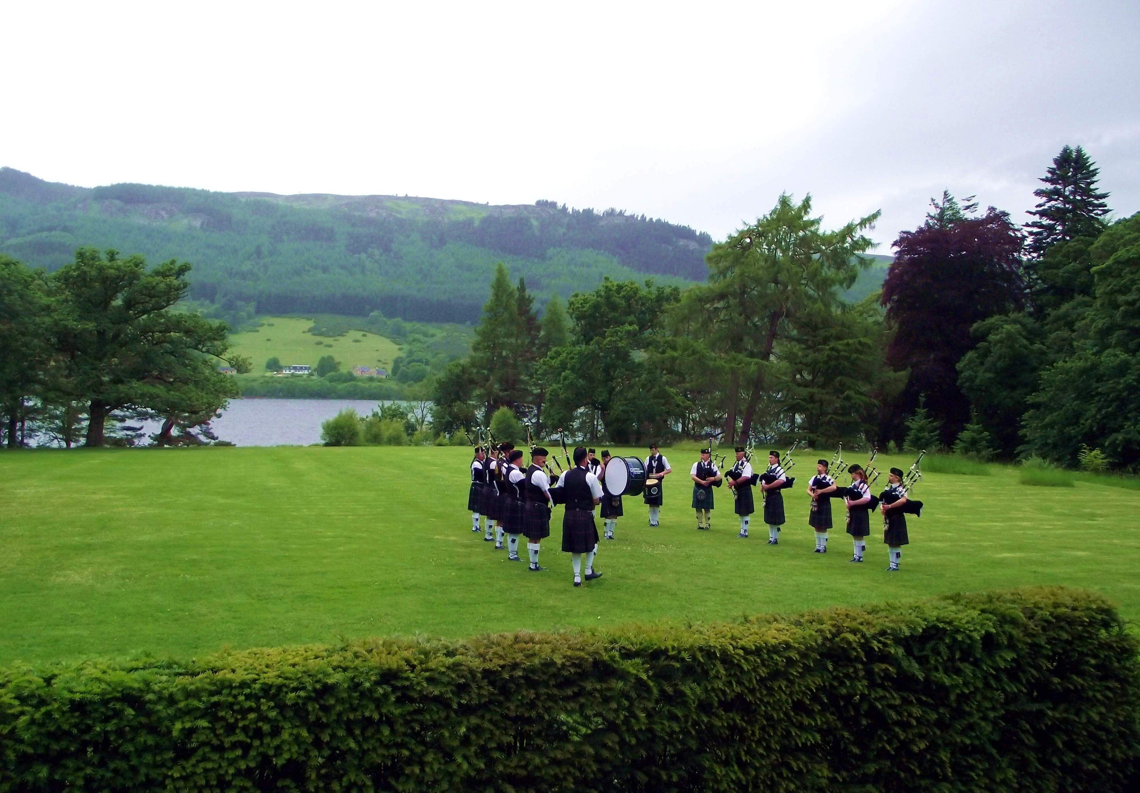 Performing on the Castle Lawn in front of Aldourie Castle, with Loch Ness as the backdrop BAND at ALDOURIE CASTLE (Thursday evening) - the Band entertained at a private event at Aldourie Castle on Loch Ness-side and completed the performance just as the first drops of rain arrived up Loch Ness. As ever, Band timing was immaculate - we missed the deluge by a matter of minutes!
