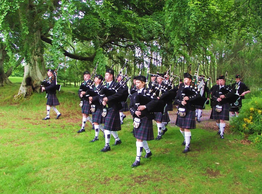 Pipe Major Steve spencer leads the Band out of the avenue on to the lawn in front of the Castle. NORTHERN CONSTABULARY Community Pipe Band www.facebook.com/pages/NorCon-PipeBand/1385366948451393 performed at Aldourie Castle on Loch Ness-side last evening. It was a lovely evening in a lovely setting, but the light wasn't very good.