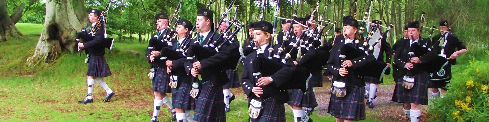 Pipe Major Steve spencer leads the Band out of the avenue on to the lawn in front of the Castle. NORTHERN CONSTABULARY Community Pipe Band www.facebook.com/pages/NorCon-PipeBand/1385366948451393 performed at Aldourie Castle on Loch Ness-side last evening. It was a lovely evening in a lovely setting, but the light wasn't very good.