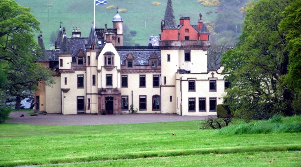 1,000 views on 14th December 2013 The yellow bushes are whins (gorse) on the slopes of the opposite side of Loch Ness. The Pipe Band played at a private engagement at Inverness's very own fairytale castle this evening. The weather was windy and raining, so thankfully it was possible for the band to play indoors in the Castle Hall. "Nestling on the quiet southern shore of the famous Loch Ness, close to the City of Inverness, the capital of the Scottish Highlands, Aldourie Castle Estate offers you a rare taste of Highland living at its best." Please visit www.aldouriecastle.co.uk/ for lots more fascinating information about the Castle and its Estate.