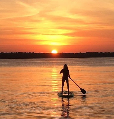 Paddling off into the Minnesota sunset at Green Lake #adventure #adventurephotocontest
