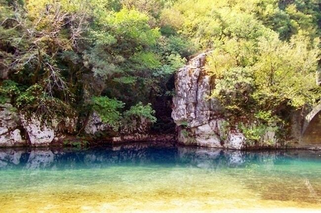 Voidomatis river,  a 215 kilometers  length branch of Aoos river,  is located in the prefecture of Ioannina in Epirus. It flows around Konitsa, in one of the most beautiful route crossings of Greece with its most spectacular  view being the mountain scenery at Gorge Vikos. The area has been declared as a national park since 1973.