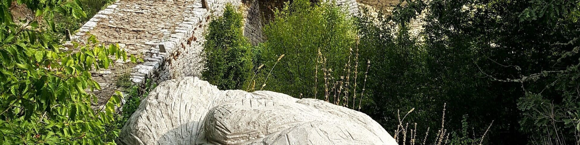 My husband and I traveled through Greece by motorcycle, and we explored different historic sites. This region in Greece has a series of stone bridges that were built during the Ottoman Empire! This is an unique one because has three arches.
