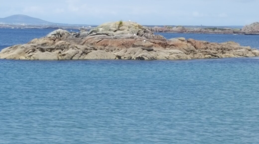 This is the Beautiful views from the Aran islands donegal.. take the arranmore ferry by car from Burtonport. And spend the day discovering the island ..drive all way around and don't look down when at the edge on the far side very narrow road in places but worth the experience..
Nice pub on seafront and great rocks for sea fishing.