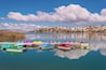 Colorful paddleboats on crystal blue Palisade Lake in Paslisade State Park. We were there in May of 2014, and woke up on Mother's Day to a surprise 9 inches of snow! It had mostly melted by the next day but still provided a pretty contrast to the bright blue sky. This state park offers fishing, camping, golfing, OHV trails, and boat rentals. #utah #palisadelake #snow #lake