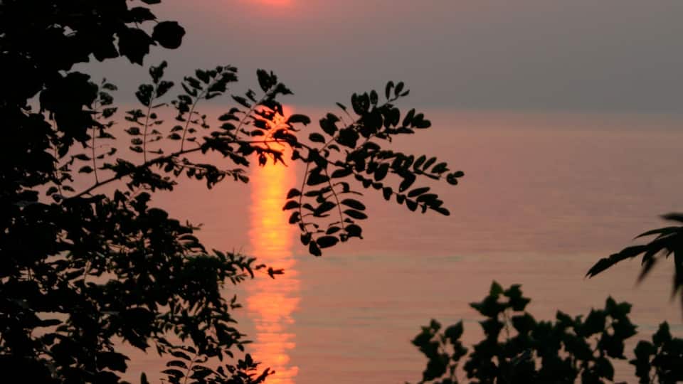 Vertical shot of sunset on the Lake Michigan, view from Glenlord Beach, Stevensville, MI