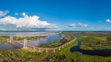 The Nanay, a tributary of the Amazon, joins the Amazon River under the sun