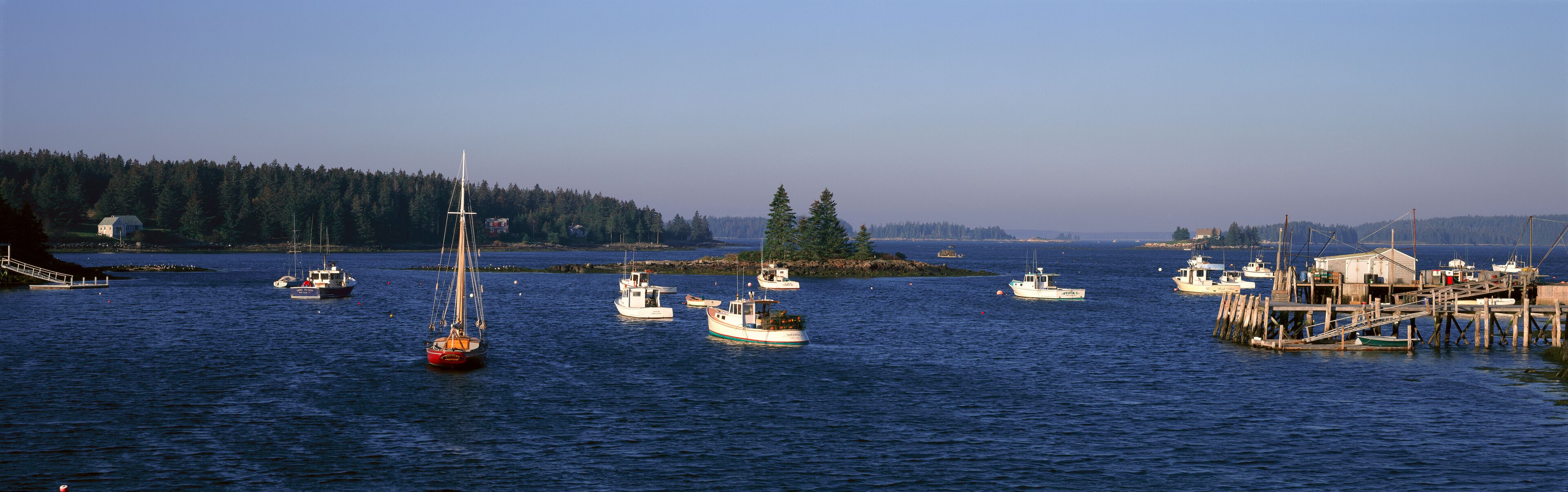 Panoramic harbor view of Lobster Village on Mount Desert Island in Stonington, ME