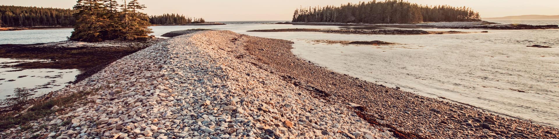 Natural sea wall along Schoodic Peninsula at sunset, Acadia National Park, Maine, USA