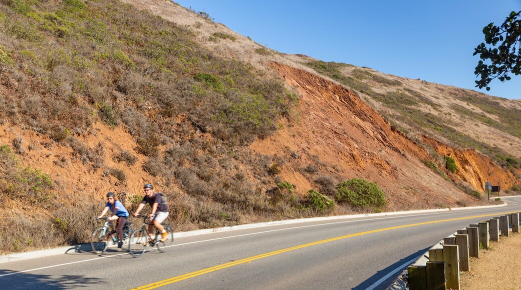 Sunset District showing tranquil scenes and road cycling as well as a couple