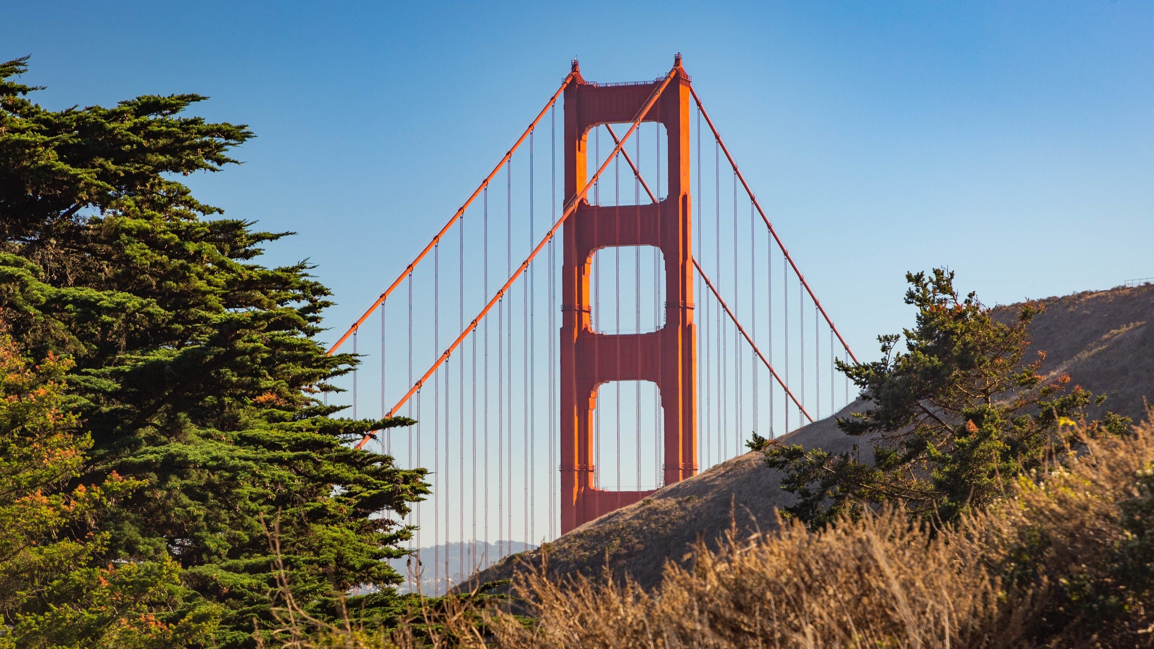 Sunset District featuring a bridge and a sunset