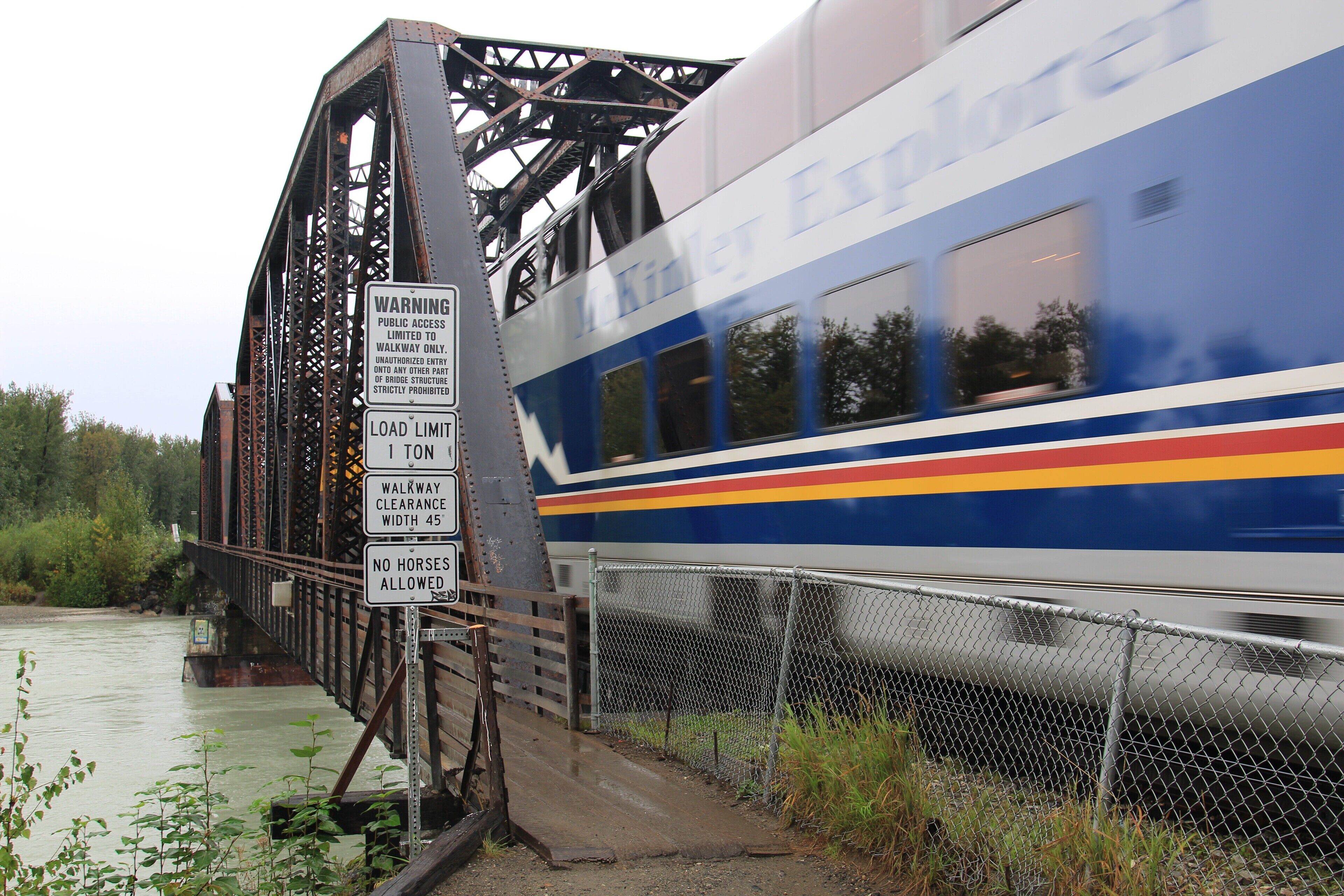 Alaskan railroad will stop along the tracks to pickup hikers