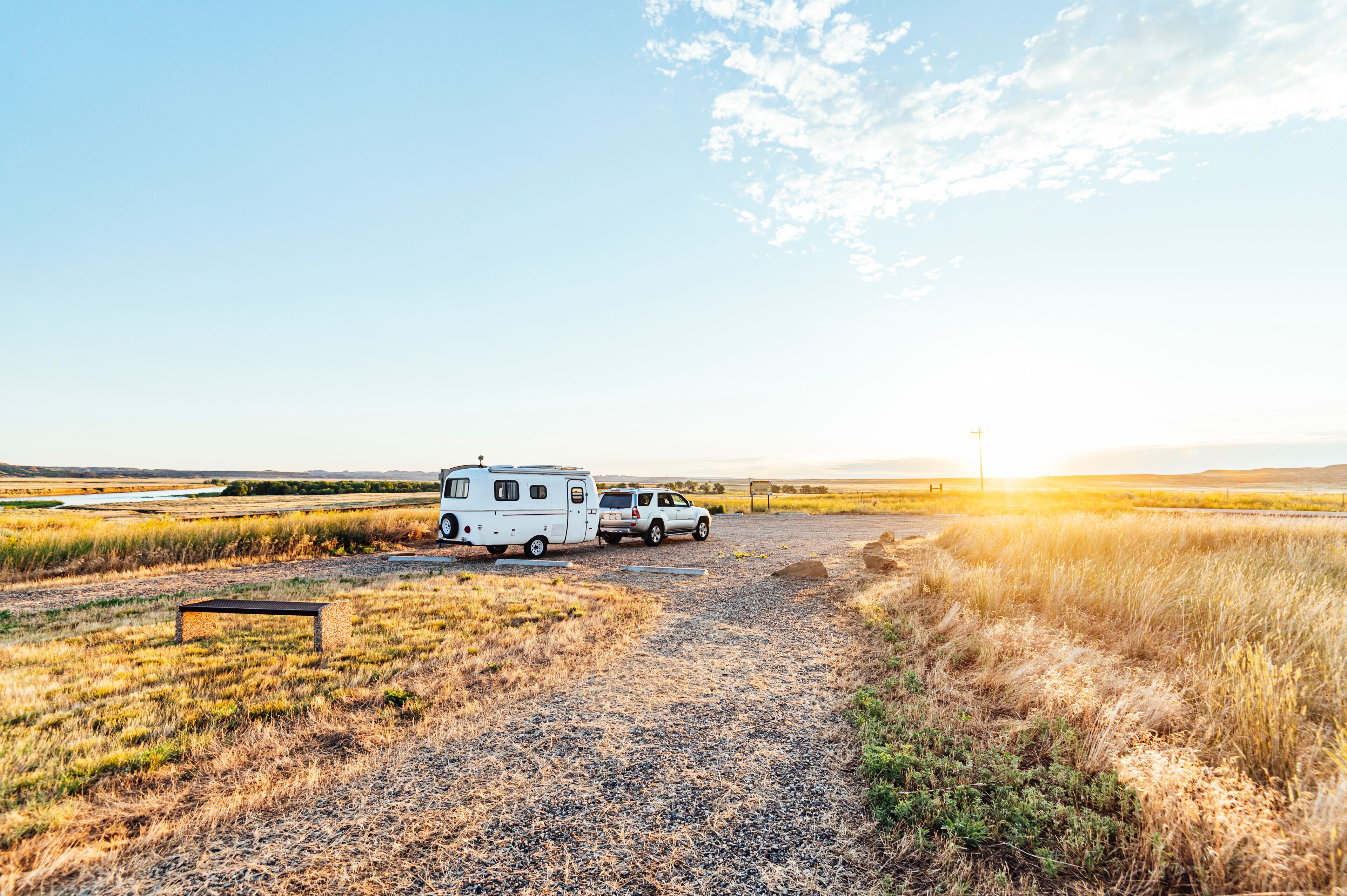 Morning light hitting a small camper in Montana