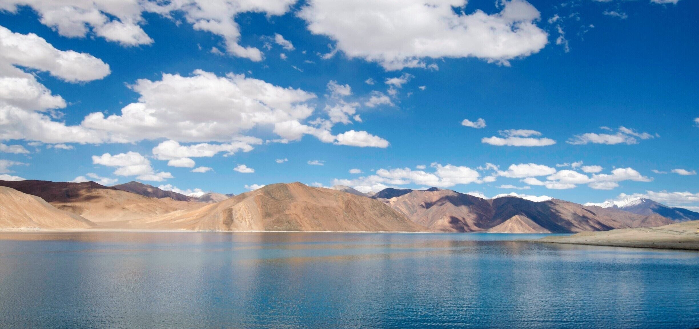 The beautiful salt water Pangong Lake at an altitude of 14,000 ft in Himalayas. This is pure nature with blend of blue water, massive mountains and big desert. Before you decide to "walk around this beautiful lake" make a check on its size. It runs 83 miles in length. Oh Yeah!!!

#LifeAtExpedia
