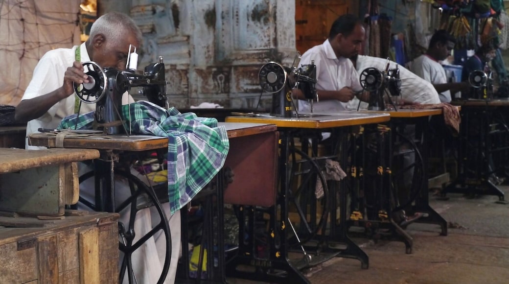 The temple at Madurai is impressive enough, but next door you can get a tailored shirt whipped up in a couple of hours in a fabric market in a mad old temple. Seriously, when you get there, look up!! #Golden