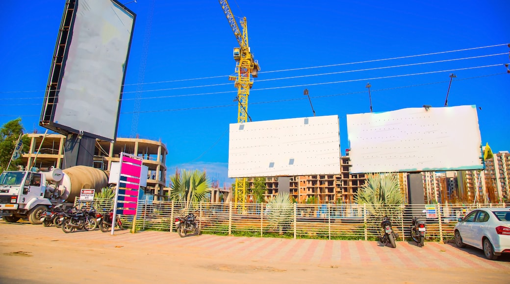 ranchi, India - june 2019 : a big car parking near under construction building in ranchi