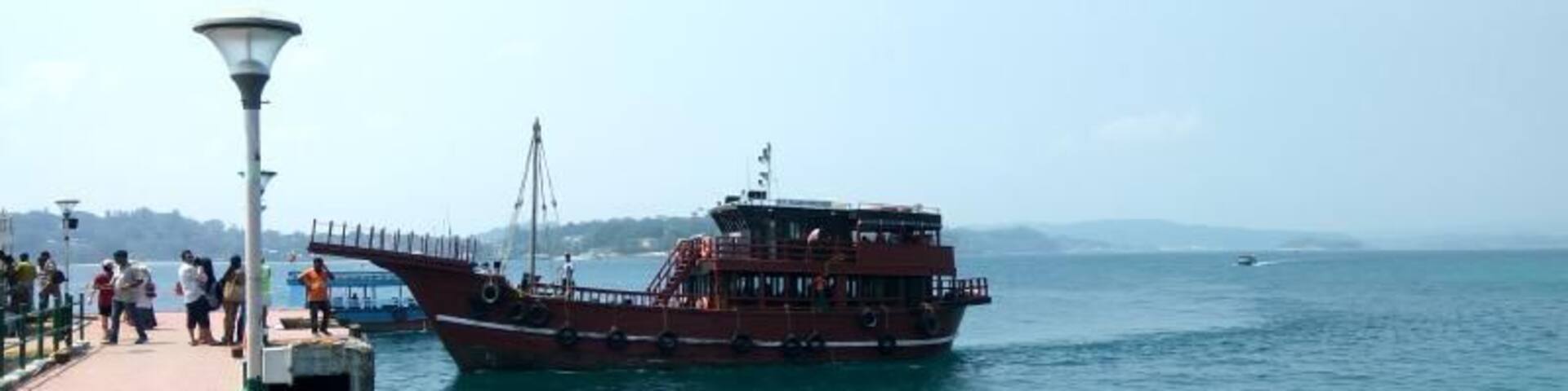 Rajiv Gandhi Water Sports Complex in Andaman for boarding a ferry to Ross Island and North Bay.
For Schedules, you can visit here: https://www.eternalandamans.com/port-blair/rajiv-gandhi-water-sports-complex