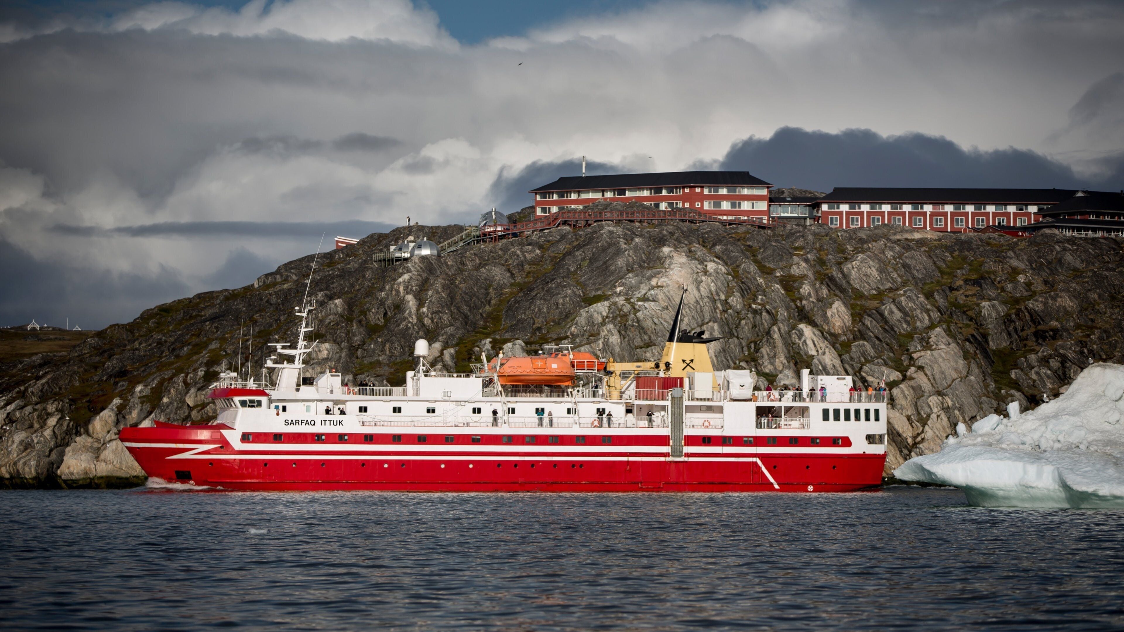 Ilulissat featuring general coastal views, mountains and a ferry