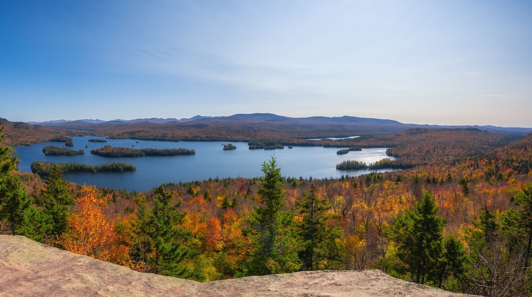 Panorama of the fall foliage and Tupper lake from Castle Rock summit in the Adirondacks New York
