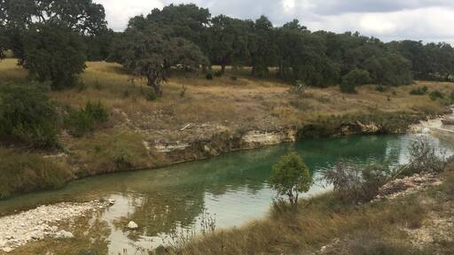 Private swimming hole at a friends' enclosed ranch.