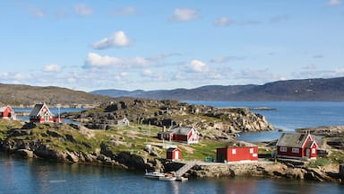 Sisimiut featuring mountains and a small town or village