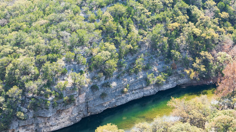 A canyon with a river running through it.