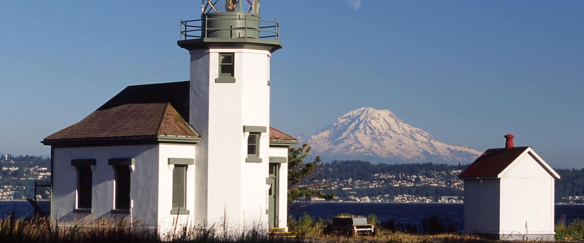 USA, Washington, Vashon Island. Point Robinson lighthouse, built 1915, and Mt. Rainier