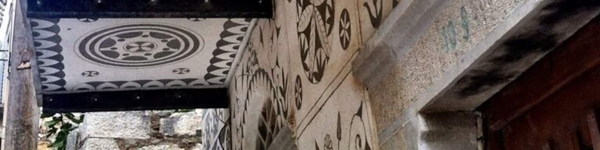 Handmade house painted walls; Picasso also said about this town houses walls" unbeliveable"